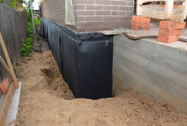 Happy homeowners after waterproofing job in Glendale Heights